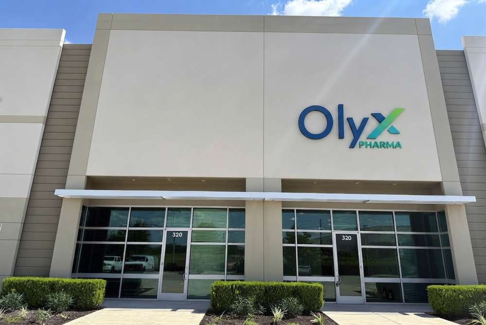 Entrance of the Olyx Pharma facility, Suite 320, in Schertz, Texas